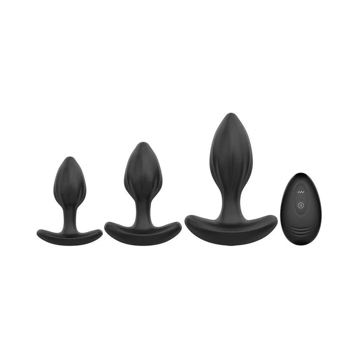 Set of three black silicone vibrating anal plugs in small, medium, and large sizes with a matching remote control.