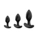 Set of three black silicone anal plugs in small, medium, and large sizes with flared bases for safe use.