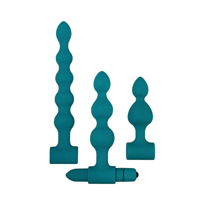 Set of three teal silicone vibrating bumpy anal plugs in varying sizes with a removable bullet vibrator.