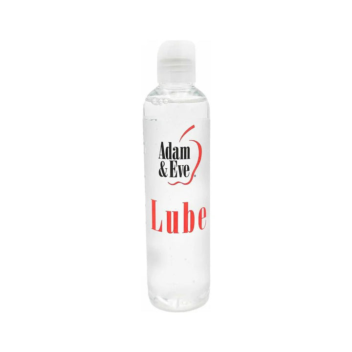 Clear 8 oz. bottle of Adam & Eve water-based lubricant with white flip-top cap and red and black branding.