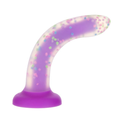 Glow-in-the-dark purple silicone pleasure toy with confetti design and suction cup base, curved shape for versatile use.
