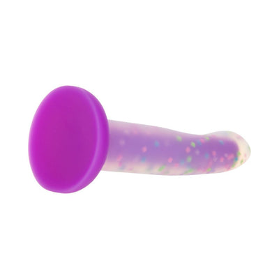 Glow-in-the-dark purple silicone toy with confetti design and suction cup base for hands-free use.