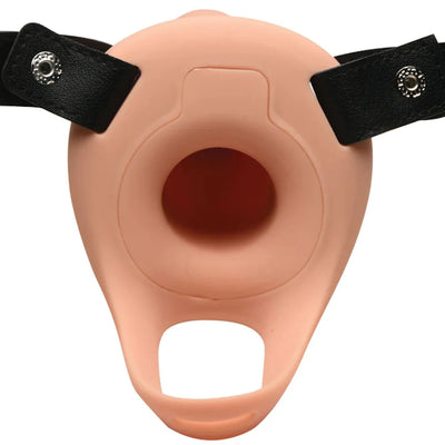 Smooth flesh-toned silicone penis sheath with black adjustable PU leather harness and metal buckles.
