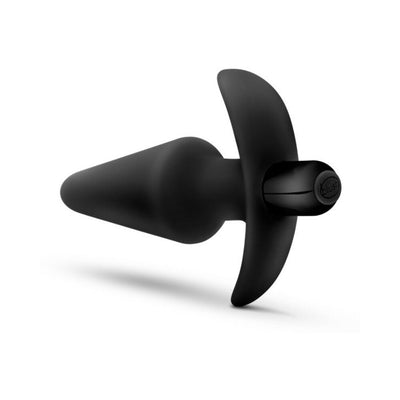 Black silicone vibrating anal plug with tapered shape and wide base featuring a removable bullet vibrator.