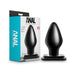 Black XXL tapered anal plug with flat base displayed next to its blue and white Anal Adventures packaging.
