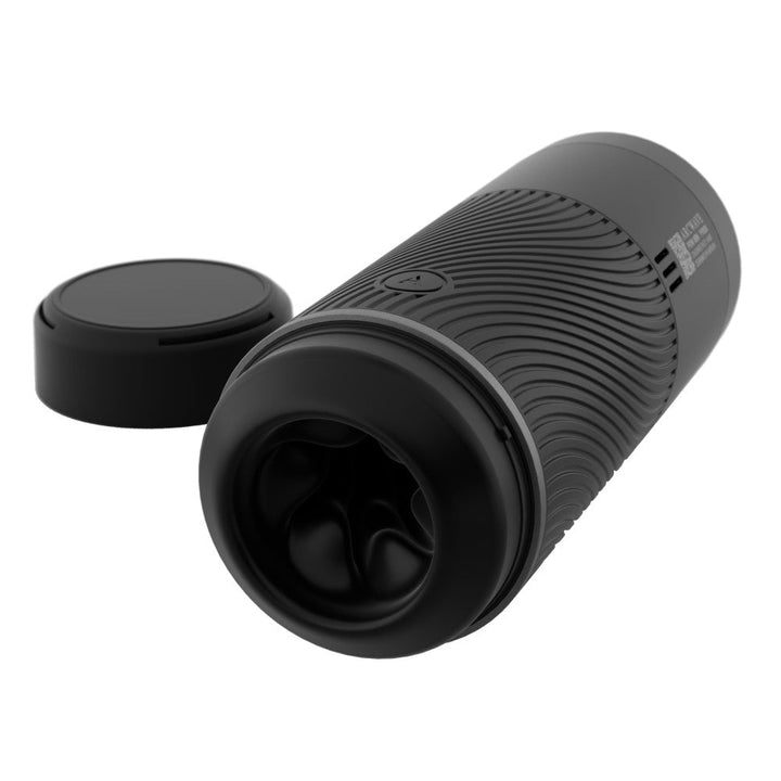 Black Arcwave Pow manual stroker with textured silicone sleeve and removable protective lid on white background.