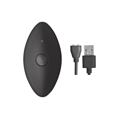 Black oval remote control with power button and red indicator light next to a USB charging cable on white background