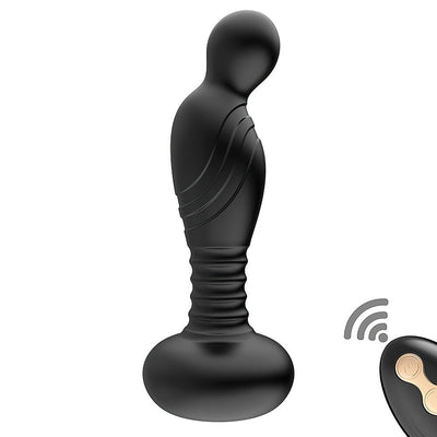 Black silicone vibrating P-spot plug with textured shaft and rounded base, shown with wireless remote control.