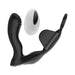 Black ergonomic prostate massager with attached cock ring and white remote control on white background.