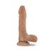 Realistic flesh-toned dildo with textured veins and suction base standing upright on white background
