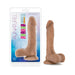 Blush Au Naturel Mister Perfect realistic dildo with suction base shown in packaging and standing upright.
