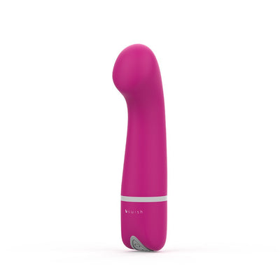 Pink curved personal massager with smooth silicone finish and ergonomic design by B Swish.