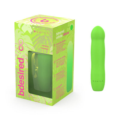 B Swish Bdesired Infinite Deluxe Limited Edition vibrant green silicone vibrating massager with packaging and USB charging cable visible.
