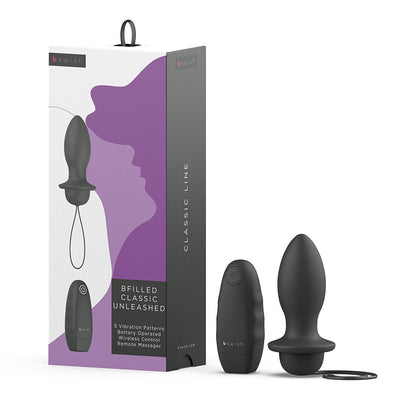 B Swish Bfilled Classic Unleashed black tapered plug with pull-string and wireless remote control beside packaging box.