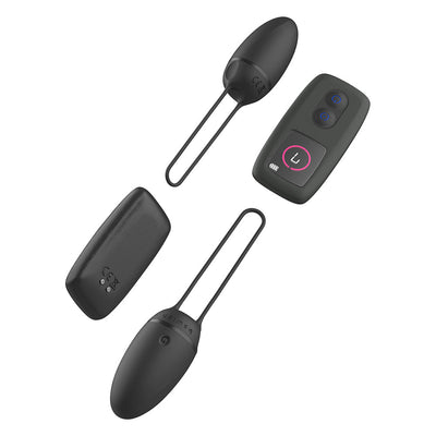 Black B Swish Bnaughty Premium Unleashed bullet massagers with wireless remote control on white background.