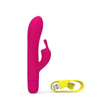 Bright pink Bwild Infinite Classic Bunny vibrator with yellow USB charging cable on white background.