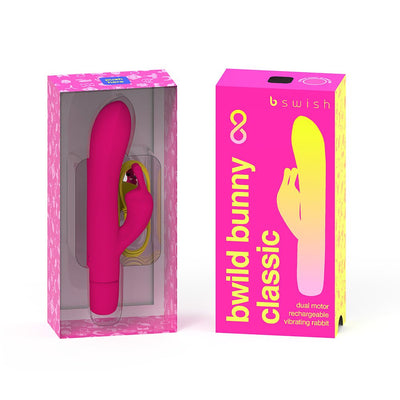 Bright pink Bwild Infinite Classic Bunny vibrator with dual motors shown in clear packaging next to its vibrant pink and yellow box.
