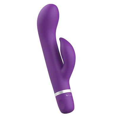 Purple dual-stimulation vibrator with contoured head and smaller tickler arm, sleek silicone design with silver accent ring.