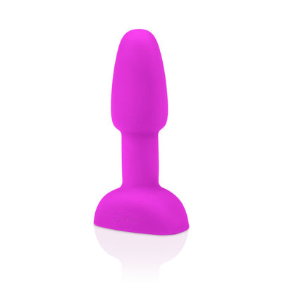 Compact purple silicone vibrating rimming plug with a tapered tip and wide base for comfortable beginner use.