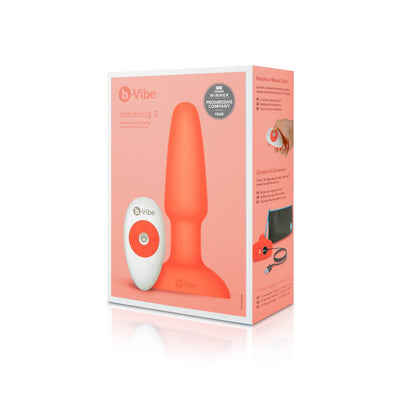 B-Vibe Rimming Plug 2 in coral with white and coral wireless remote control shown on product packaging.