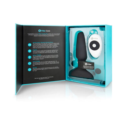 B-Vibe Rimming Plug 2 with wireless remote in open turquoise box packaging showing product details and instructions.