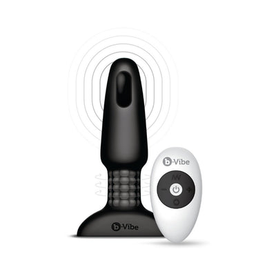 Black B-Vibe Rimming Plug 2 with rotating beads and wireless white remote control on white background.