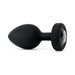 Black silicone vibrating plug with a tapered shape and a jeweled base, USB rechargeable and body-safe design.