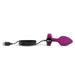 Purple b-Vibe vibrating jewel plug with USB charging cable on white background.