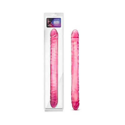 Pink translucent double-ended dildo shown in packaging and outside, with textured surface and rounded ends.