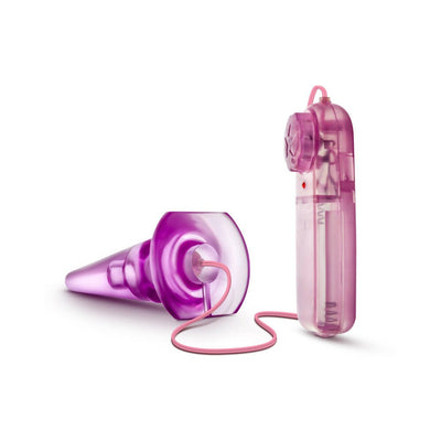 Purple translucent anal pleaser with wired remote control on white background.