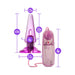 Purple tapered anal plug with wired multi-speed remote control and size dimensions displayed.