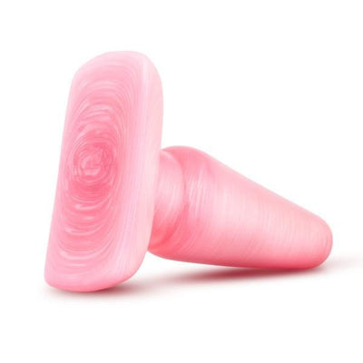 Medium-sized pink swirled butt plug with a wide base, designed for comfortable and secure use.