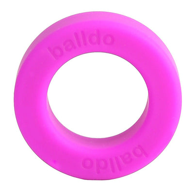 Bright pink silicone spacer ring with balldo branding embossed on the surface, designed for extra support in Balldo sets.