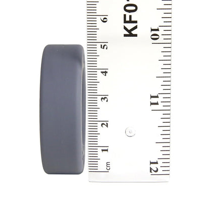 Steel grey Balldo spacer ring shown next to a ruler for size reference.