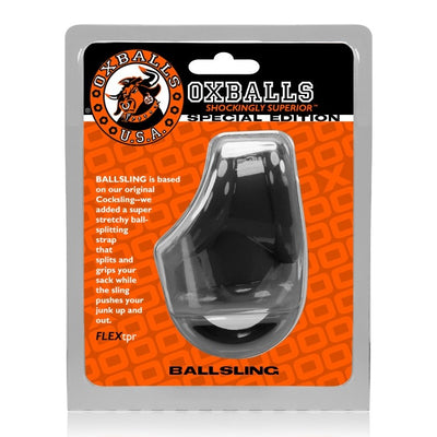 OxBalls Ballsling ball-splitting sling in black flexible material, packaged in branded orange and black box.