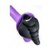 Close-up of Banana Pants Honeybunch black silicone grind pad fitted with a bullet vibe on a purple base.