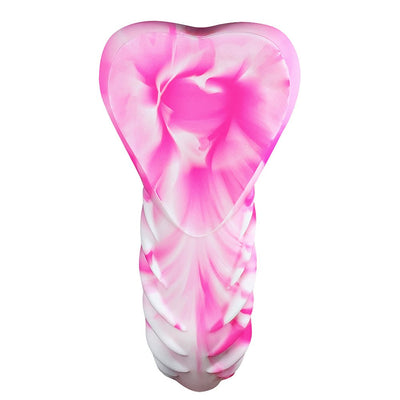 Pink and white swirl silicone Banana Pants Luvgrind hybrid pleasure toy with ribbed texture and heart-shaped base cushion.