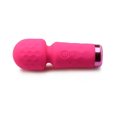 Compact pink silicone mini wand vibrator with textured head and control buttons on handle, shown on white background.