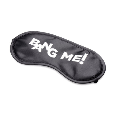 Black satin blindfold with white "BANG ME!" text and elastic straps for a comfortable fit.
