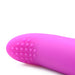Close-up of textured purple silicone finger vibe with raised dots for enhanced stimulation.