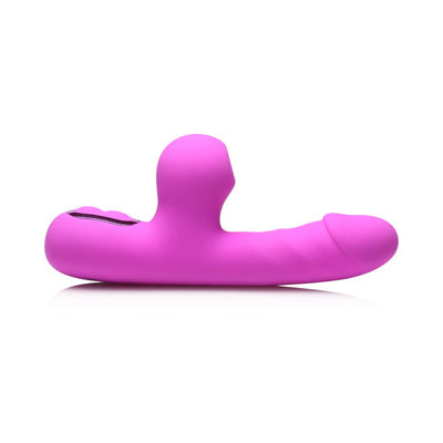 Pink mini rabbit vibrator with curved clit suction arm and textured shaft, made of smooth silicone.