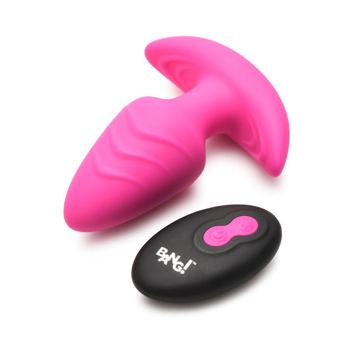 Pink silicone textured vibrating plug with curved base and black remote control with pink buttons on white background.