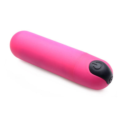 Pink compact vibrating bullet with black power button on white background