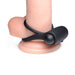 Black silicone vibrating cock ring with bullet attachment displayed on a flesh-tone model stand against white background.