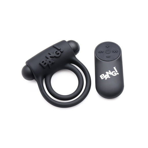Black silicone vibrating cock ring with dual rings and bullet, paired with a compact remote control featuring multiple buttons.