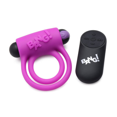 Purple silicone vibrating cock ring with dual rings and bullet, accompanied by a black remote control with multiple buttons.