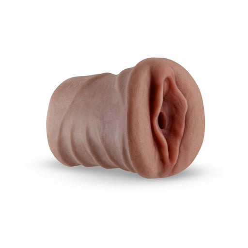 Realistic flesh-toned textured male stroker sleeve with closed end for suction and enhanced sensation.