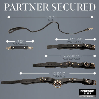Black vegan leather lovers restraints set with adjustable wrist cuffs, ankle cuffs, collar, leash, and cuff connectors with gold hardware.