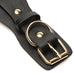 Close-up of black vegan leather strap with gold-tone buckle and D-ring detail from Bedroom Bliss Lovers Restraints Set.