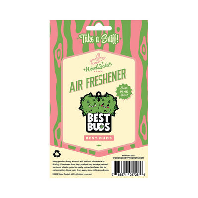 Packaging of Best Buds Air Freshener with cartoon green buds design and fresh pine scent label on pink and green wood pattern background.